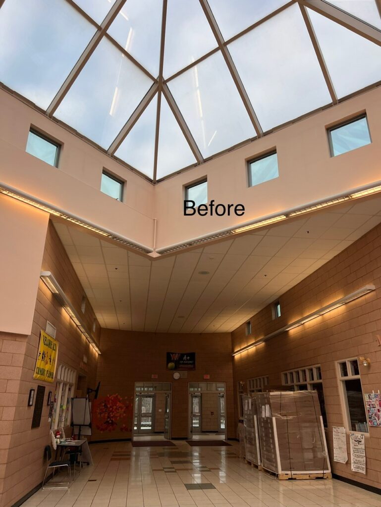 interior hallway Before lighting retrofit by TBD Lighting